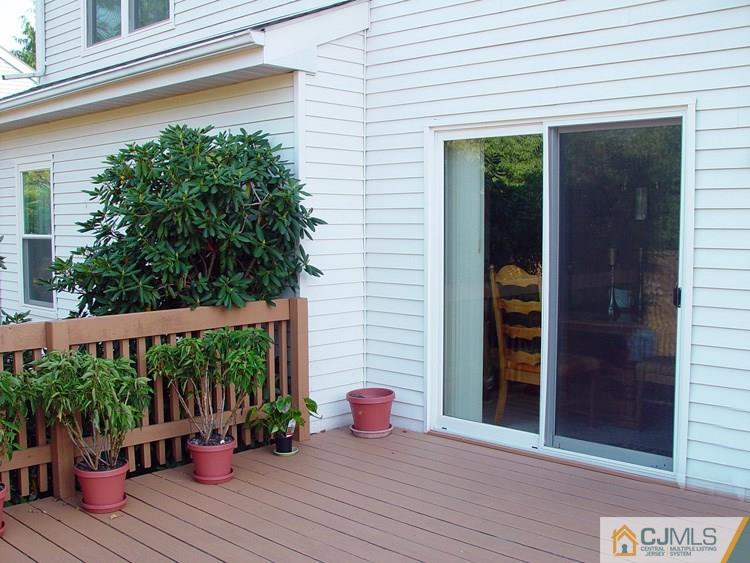 21 Smithwold Road Somerset, NJ 08873 - Photo 16 of 20 a view of a balcony with chair potted plants