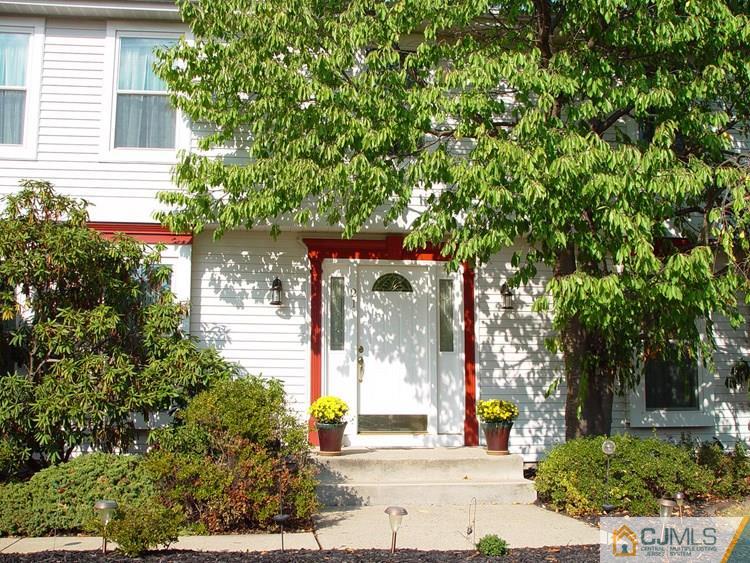21 Smithwold Road Somerset, NJ 08873 - Photo 19 of 20 front view of a house with a tree