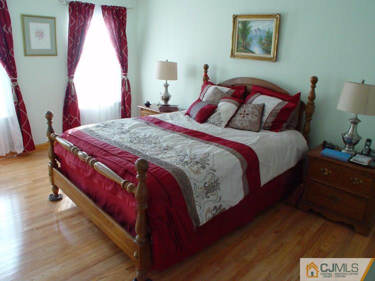 21 Smithwold Road Somerset, NJ 08873 - Photo 10 of 20 a bed sitting in a bedroom next to a window