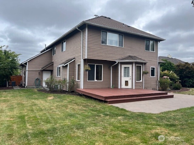 12312 9th Street East Edgewood, WA 98372 - Photo 11 of 20 a front view of a house with a garden