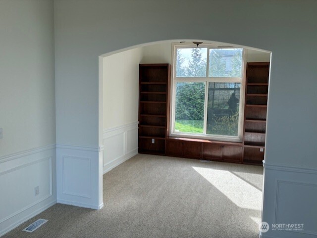 12312 9th Street East Edgewood, WA 98372 - Photo 7 of 20 a view of an empty room with a window