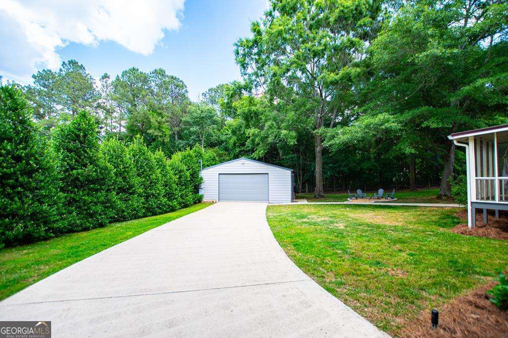 2 Pine Hill Drive Ranburne, AL 36273 - Photo 68 of 91 a front view of a house with garden