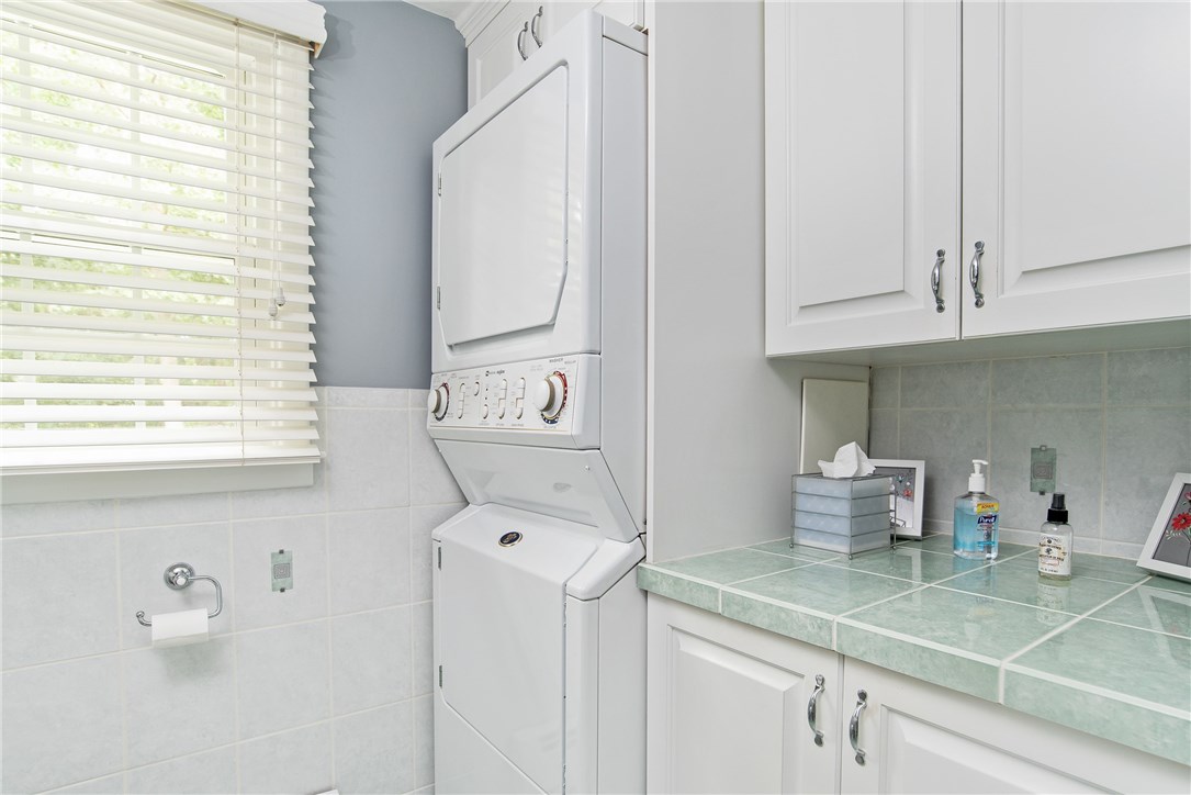 70 Timberline Road Warwick, RI 02886 - Photo 15 of 32 Built in hamper next to the stackable washer & dryer (included with the sale.) Stand up shower!