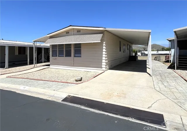 a front view of a building with many windows