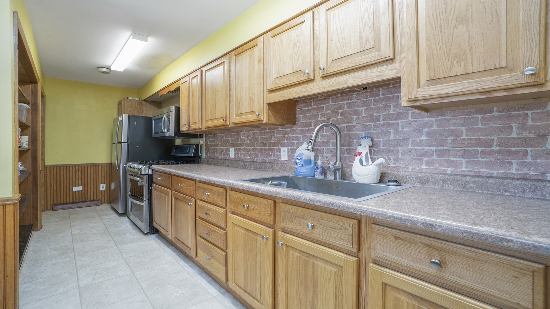 2077 Grand Detour Road Dixon, IL 61021 - Photo 13 of 33 a kitchen with stainless steel appliances granite countertop a sink and cabinets