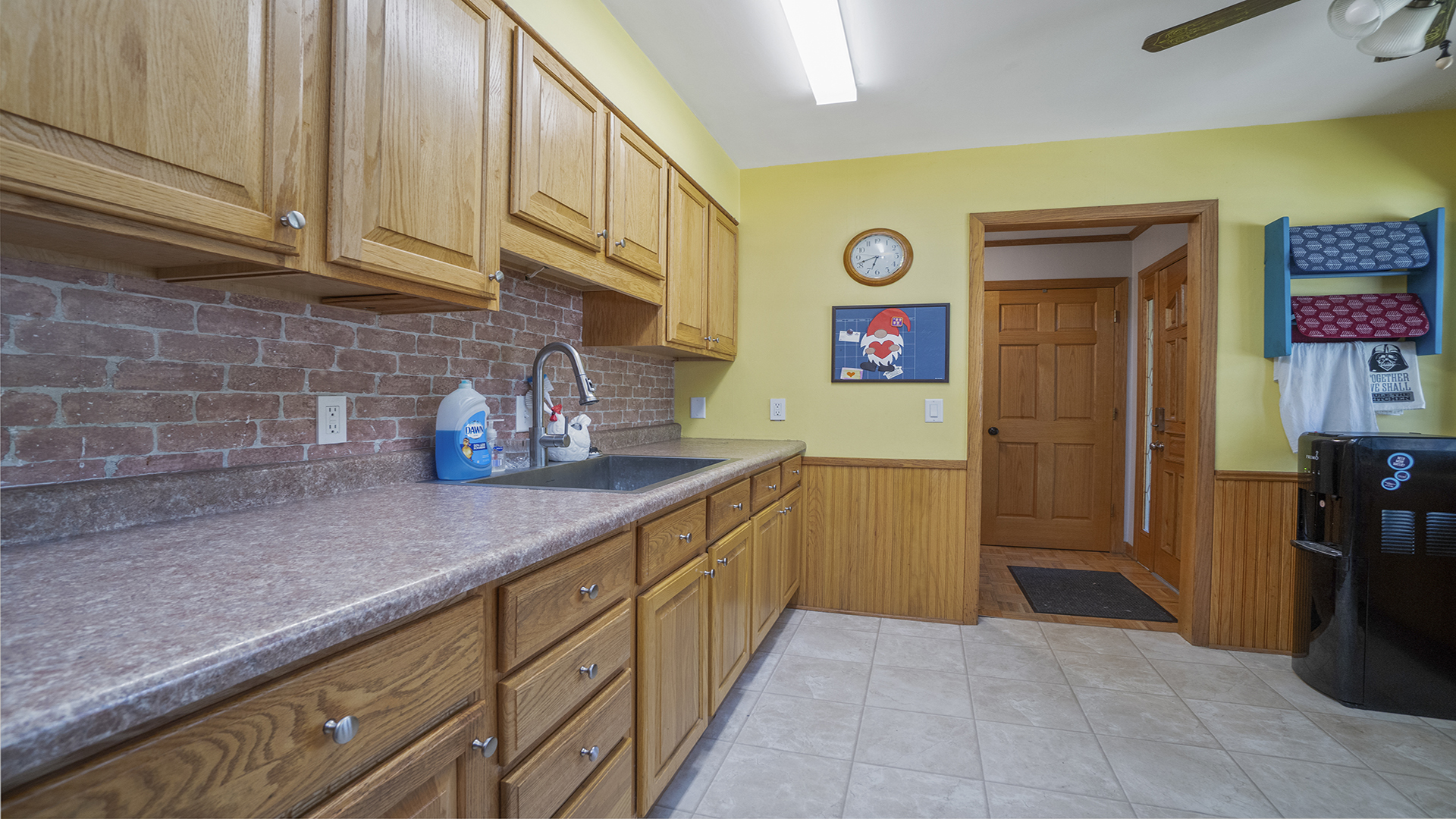 2077 Grand Detour Road Dixon, IL 61021 - Photo 14 of 33 a kitchen with stainless steel appliances granite countertop a refrigerator and a sink
