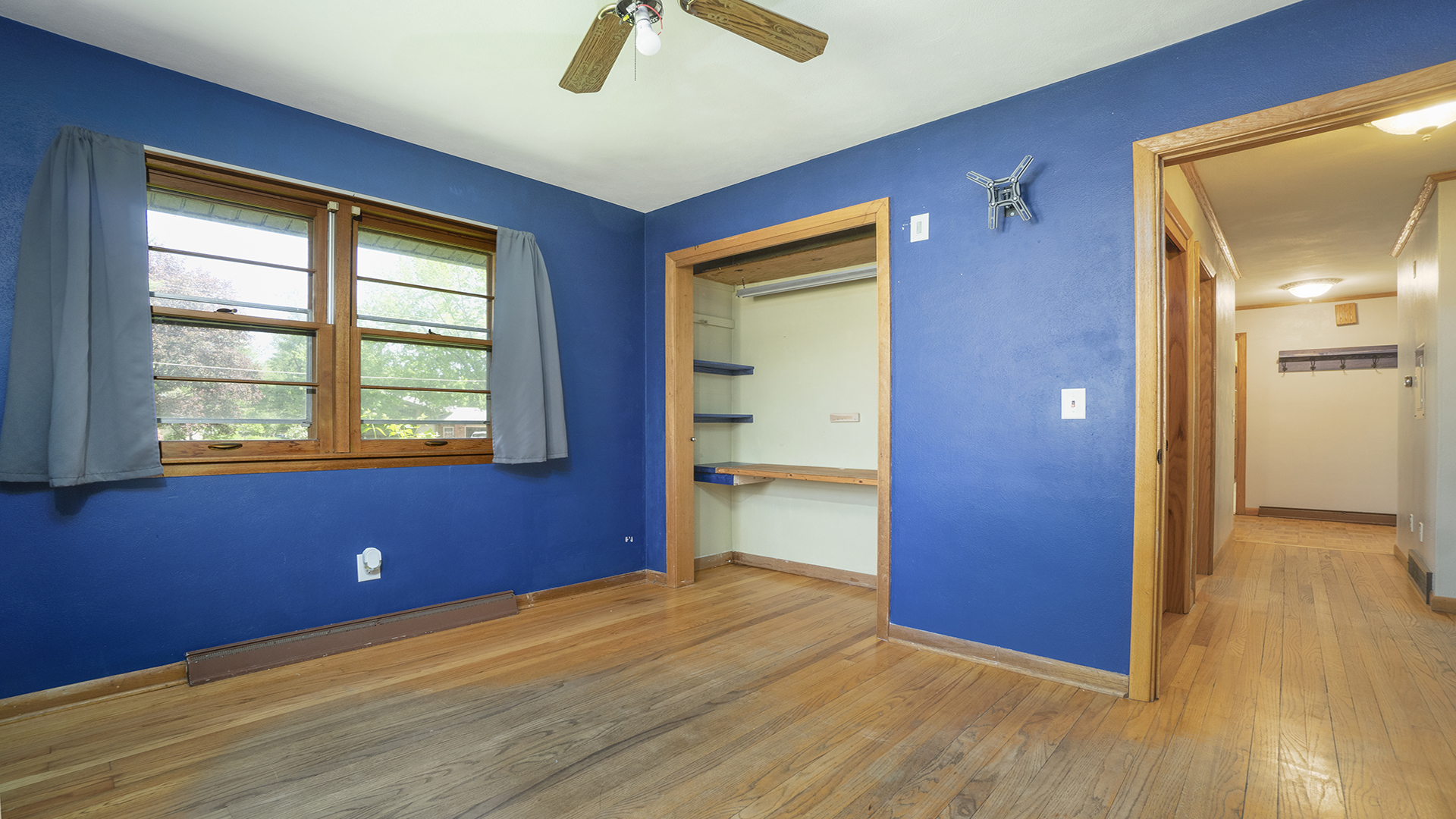 2077 Grand Detour Road Dixon, IL 61021 - Photo 29 of 33 a view of empty room with window and wooden floor
