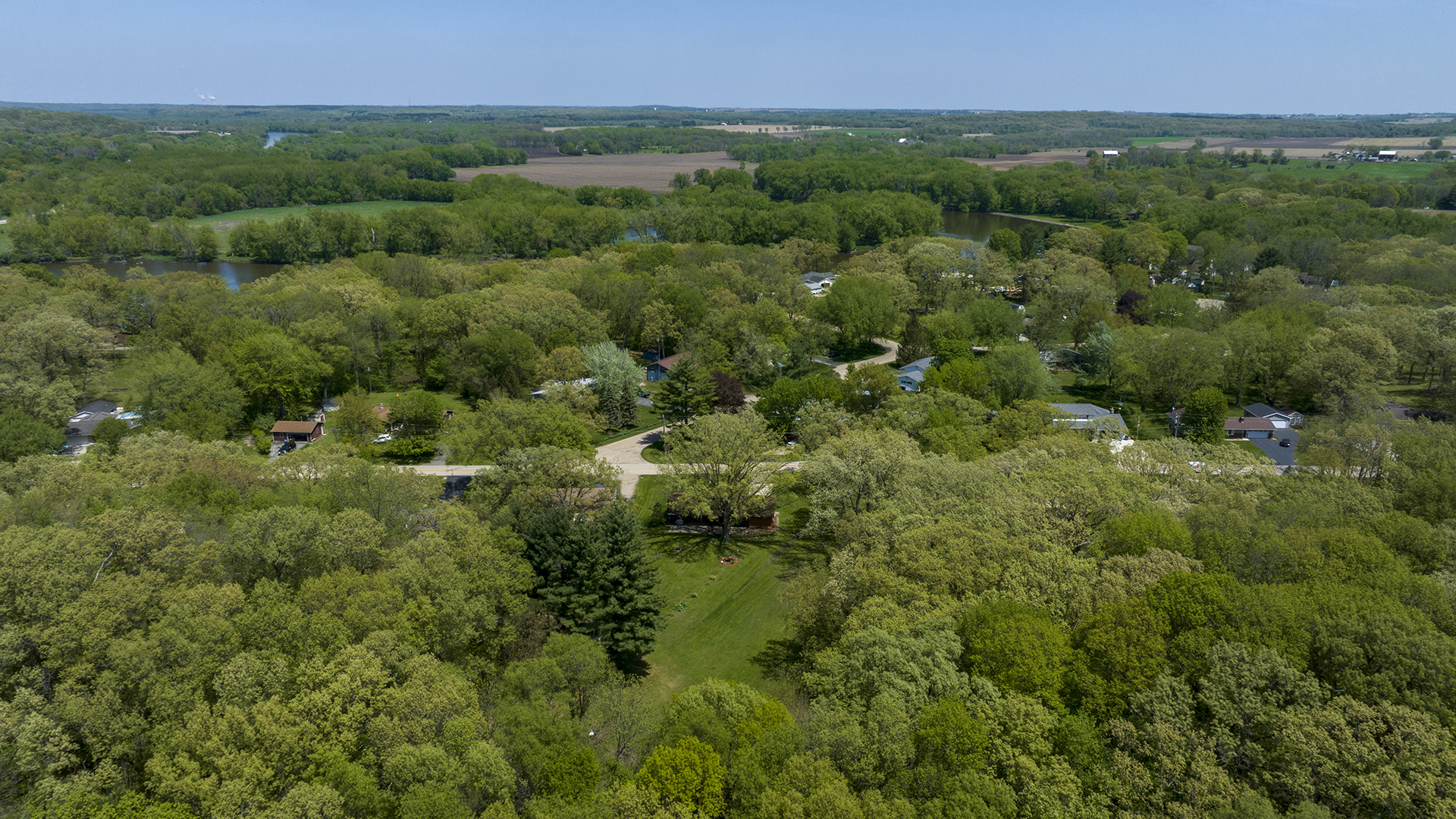 2077 Grand Detour Road Dixon, IL 61021 - Photo 6 of 33 an aerial view of a houses with a yard and lake view