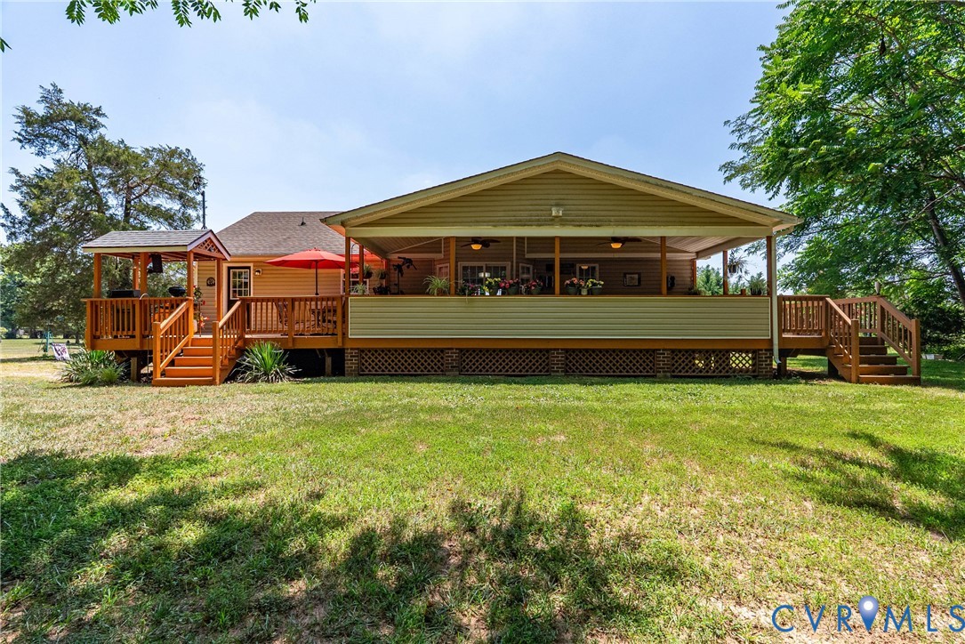 197 Goshen Road Cumberland, VA 23040 - Photo 68 of 70 Expansive backyard featuring a covered patio, addi