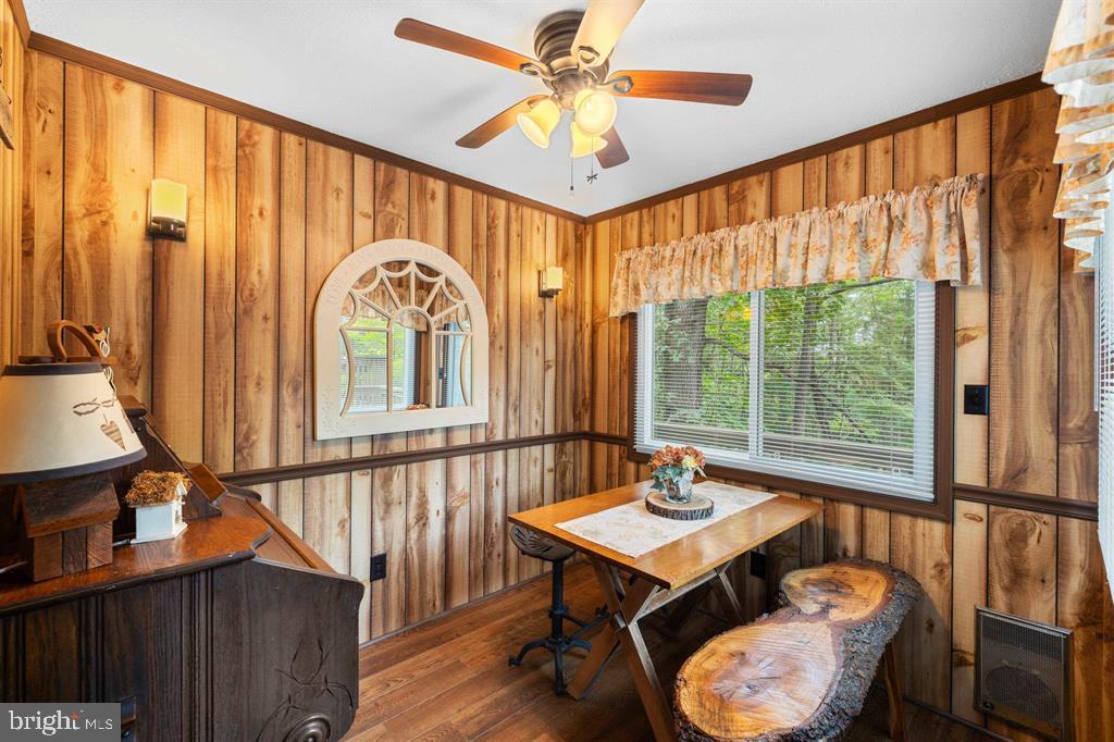 112 Judd Lane Mount Jackson, VA 22842 - Photo 28 of 63 a living room with furniture a table and a large window