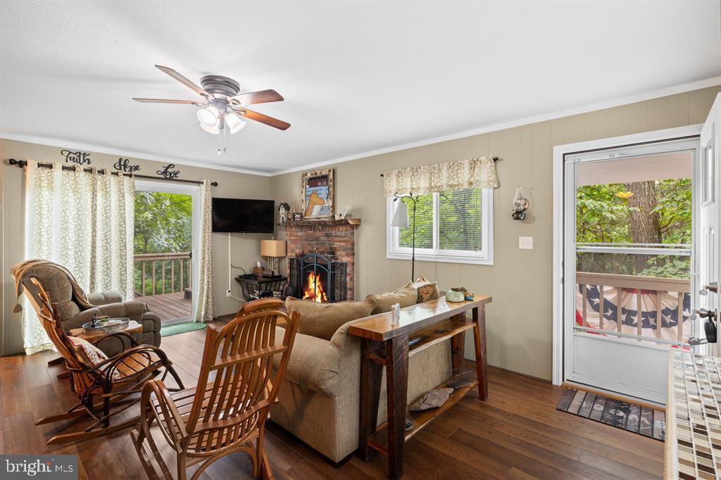 112 Judd Lane Mount Jackson, VA 22842 - Photo 9 of 63 a living room with furniture a flat screen tv and a window