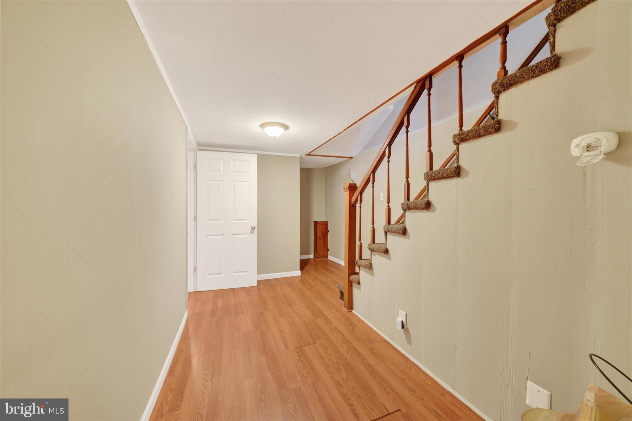 316 Lambeth Road Baltimore, MD 21228 - Photo 20 of 28 a view of entryway with wooden floor