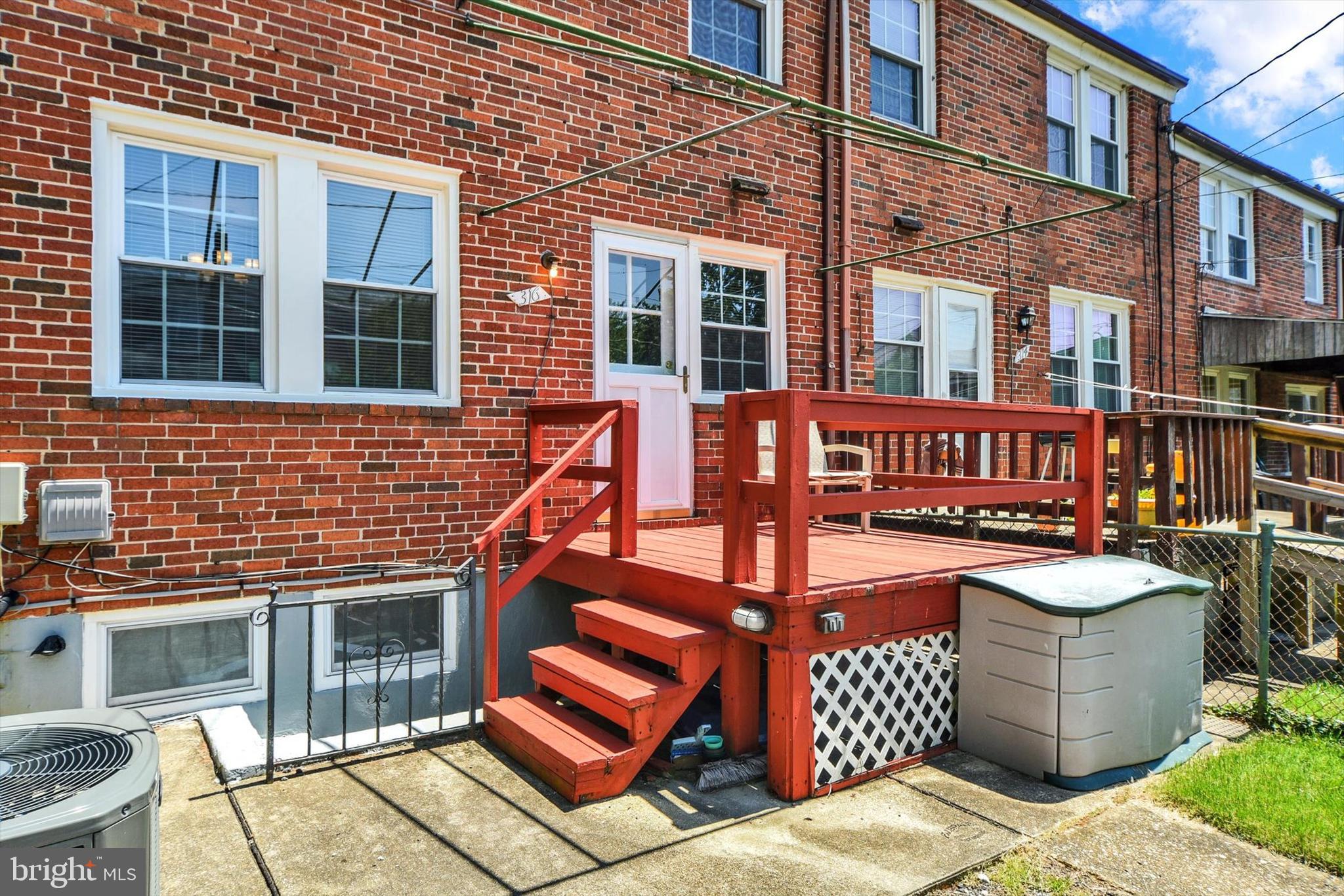 316 Lambeth Road Baltimore, MD 21228 - Photo 28 of 28 a front view of a house with outdoor seating