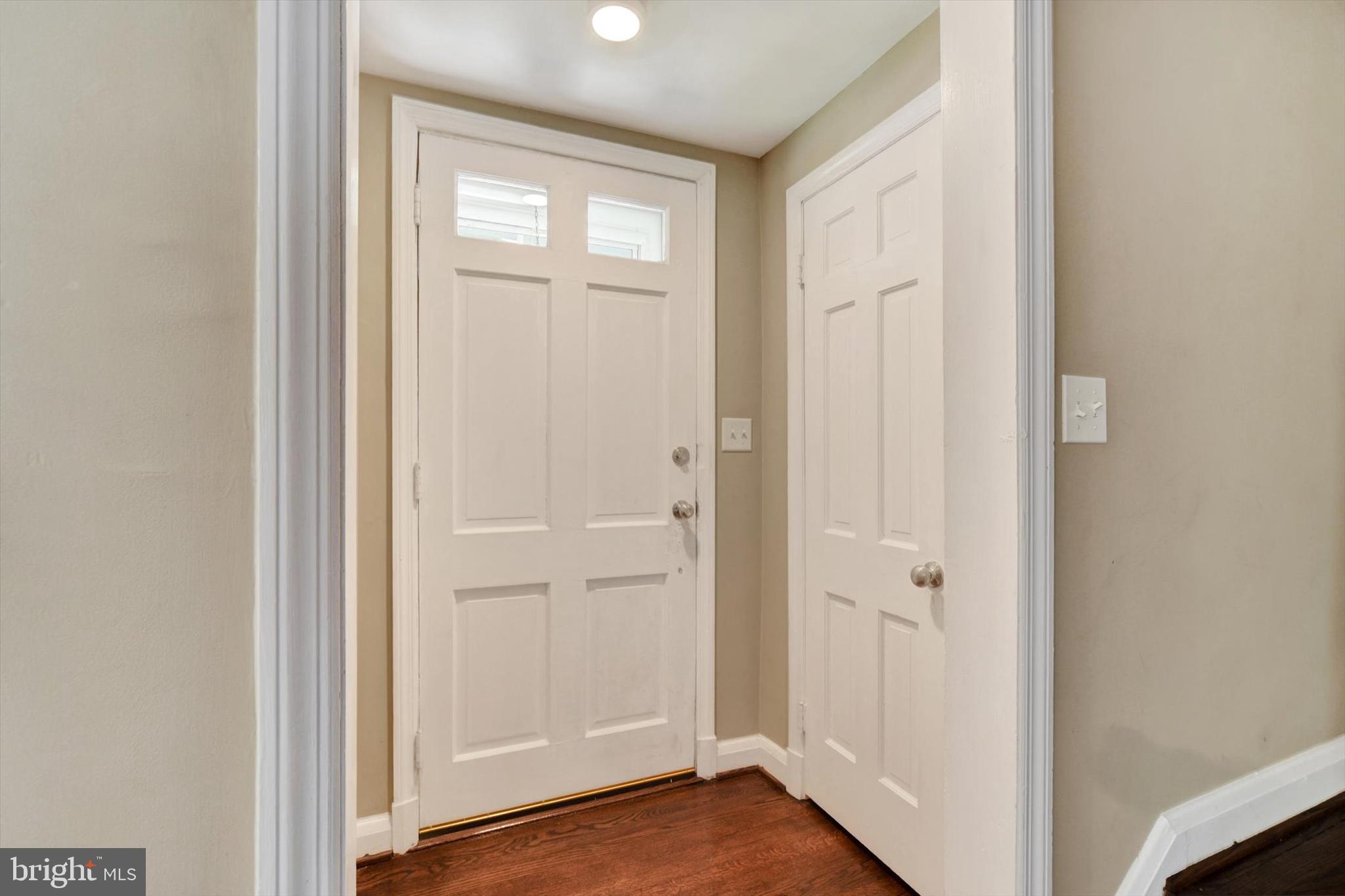316 Lambeth Road Baltimore, MD 21228 - Photo 4 of 28 a view of a bathroom with wooden floor