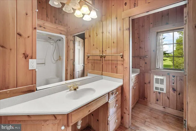 a view of a balcony with wooden floor