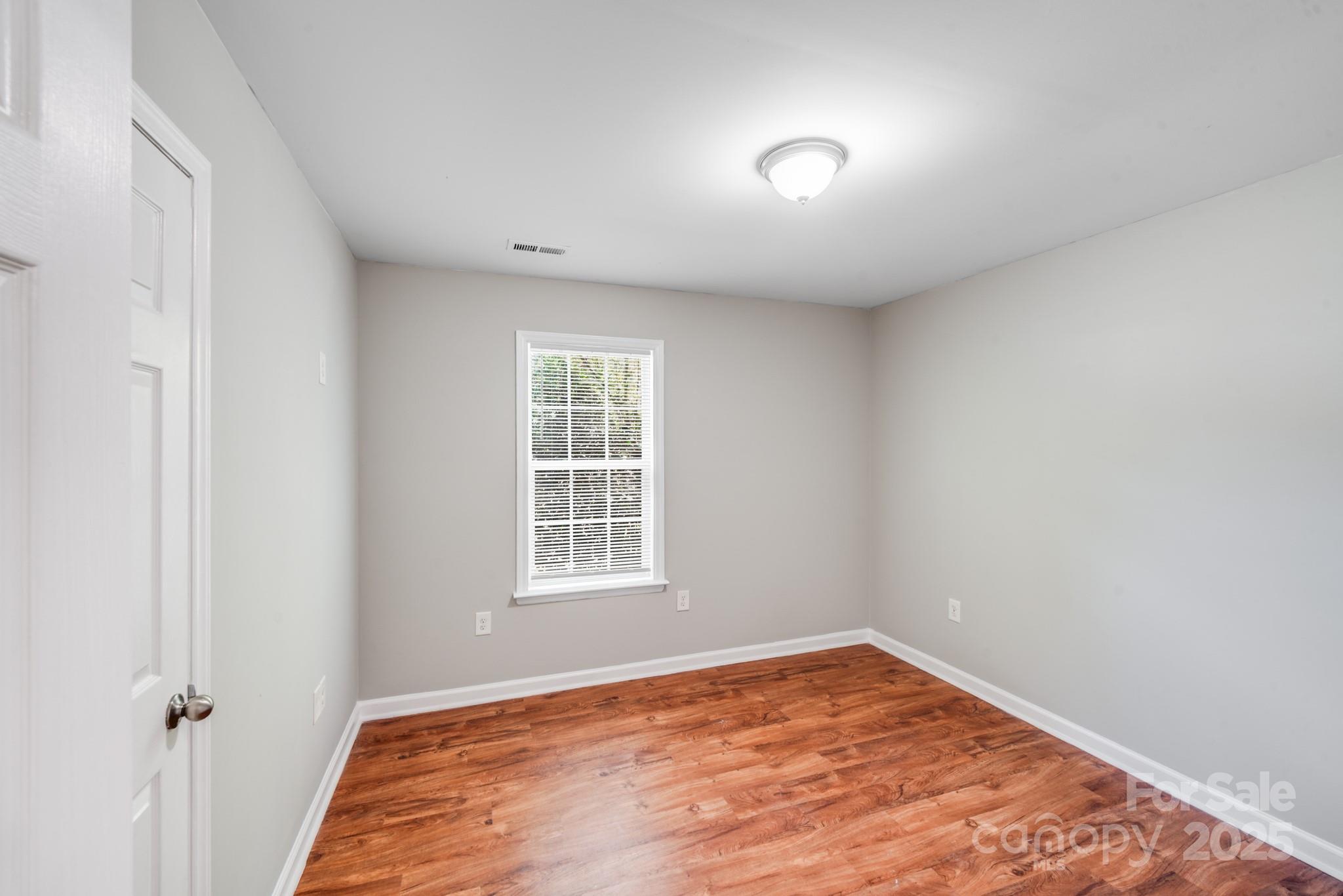 3134 Rainbow Ridge Drive Matthews, NC 28105 - Photo 12 of 20 an empty room with a window