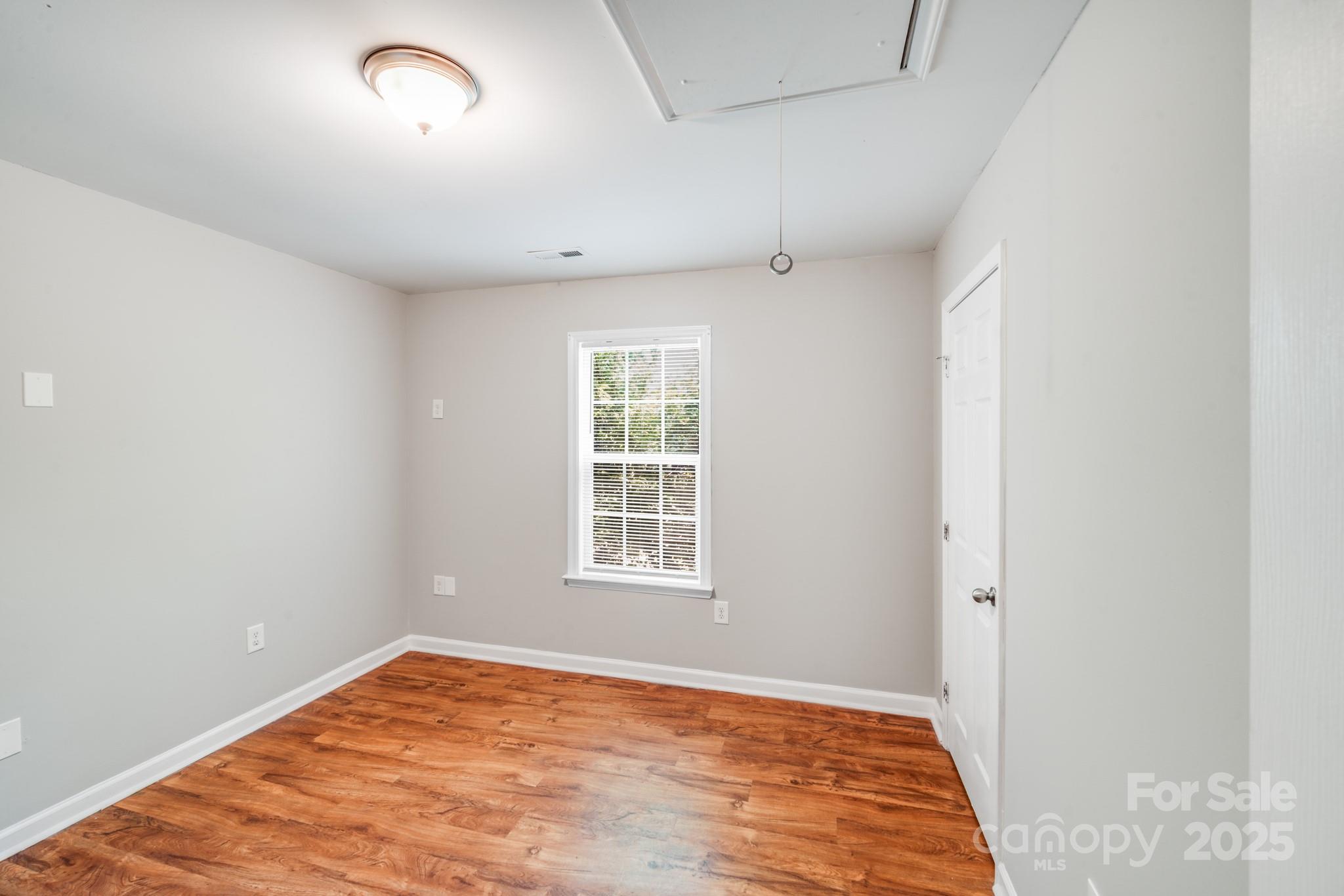 3134 Rainbow Ridge Drive Matthews, NC 28105 - Photo 13 of 20 an empty room with window