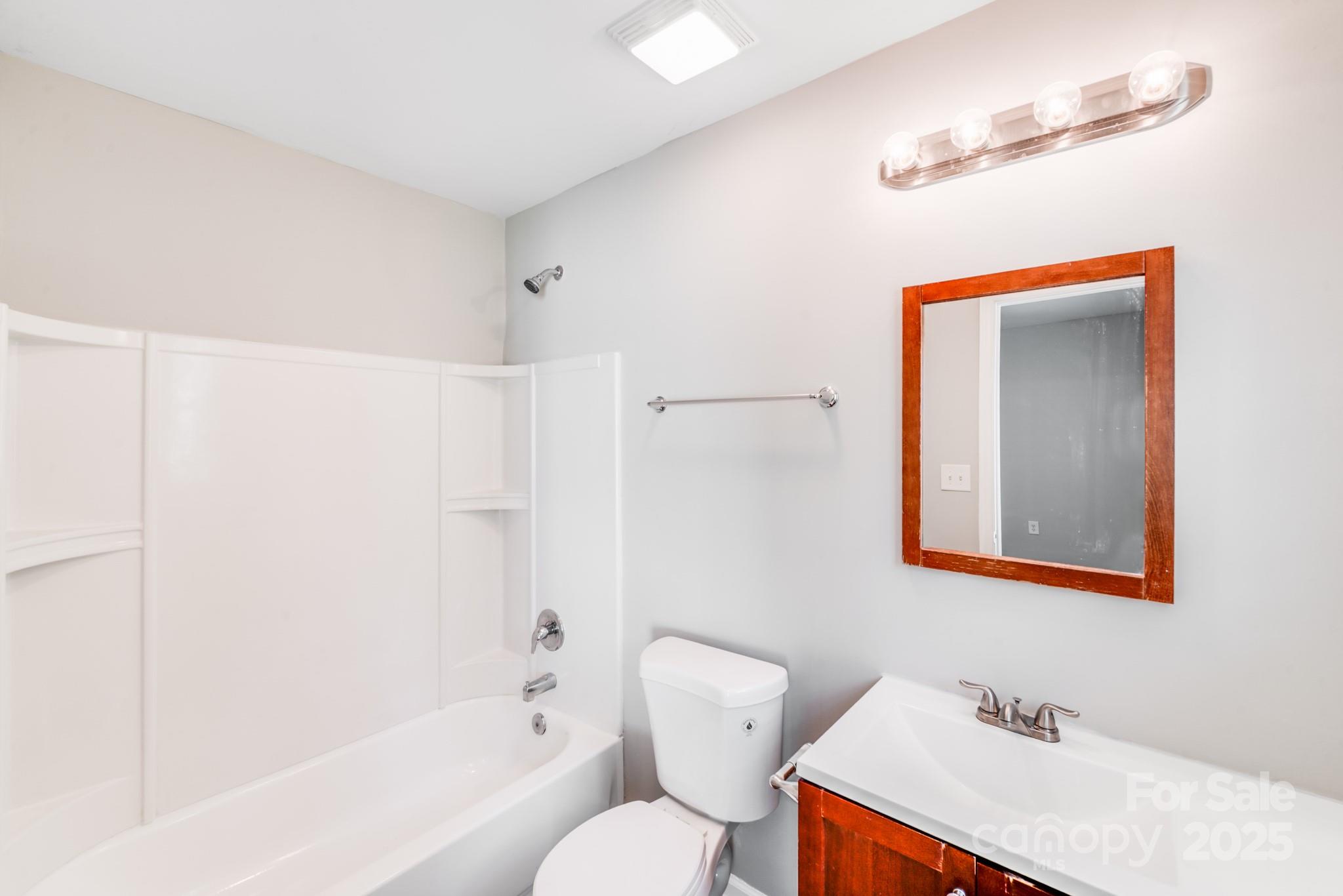 3134 Rainbow Ridge Drive Matthews, NC 28105 - Photo 17 of 20 a bathroom with a sink toilet and shower