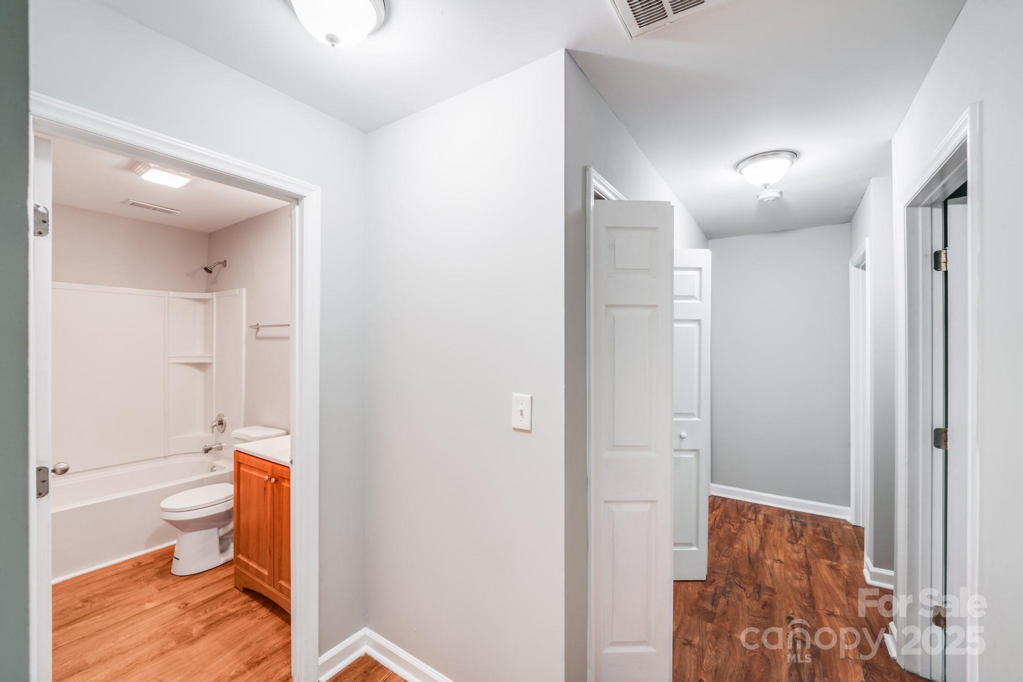 3134 Rainbow Ridge Drive Matthews, NC 28105 - Photo 10 of 20 a bathroom with a toilet sink and shower