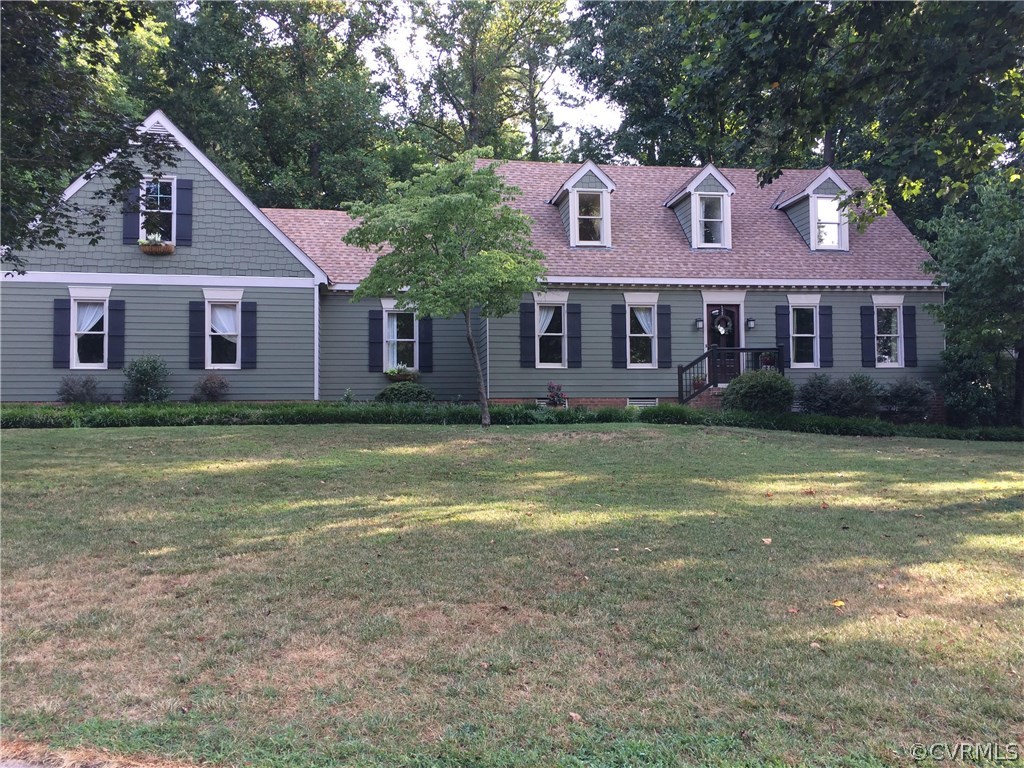 6007 Moss Creek Road Midlothian, VA 23112 - Photo 1 of 38 a front view of a house with a garden