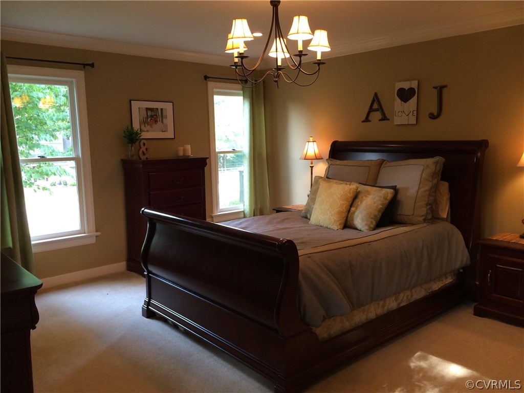 6007 Moss Creek Road Midlothian, VA 23112 - Photo 22 of 38 a bedroom with a bed and window