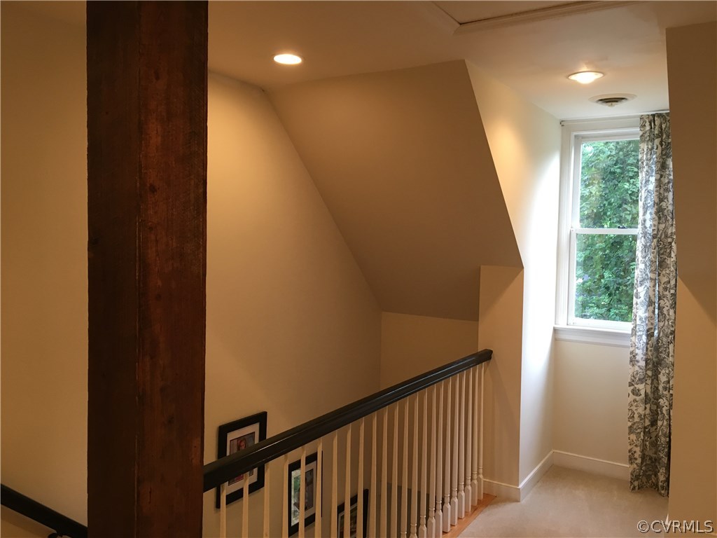 6007 Moss Creek Road Midlothian, VA 23112 - Photo 26 of 38 a view of a hallway with windows
