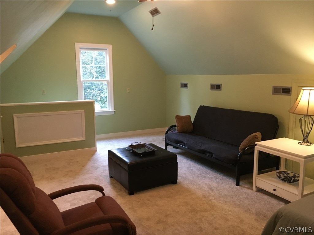 6007 Moss Creek Road Midlothian, VA 23112 - Photo 33 of 38 a living room with furniture a couch and a window