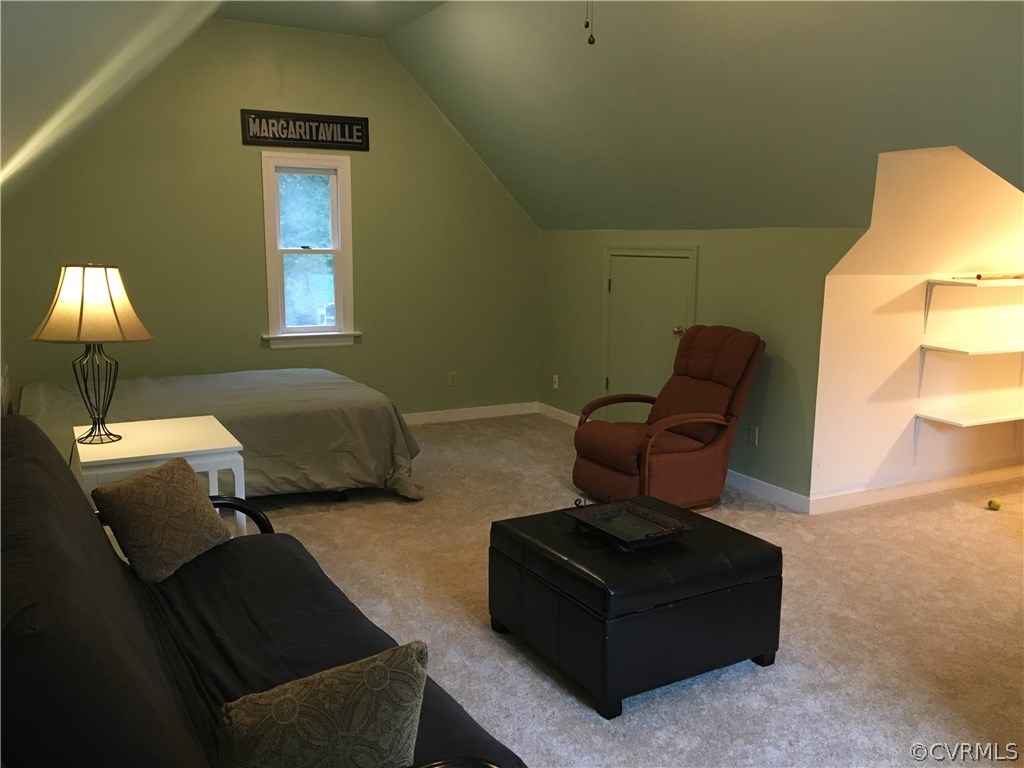 6007 Moss Creek Road Midlothian, VA 23112 - Photo 34 of 38 a living room with couches and painted walls next to a window