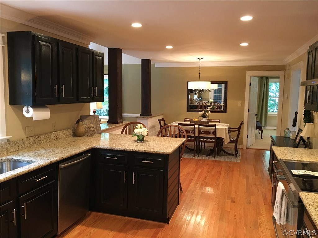 6007 Moss Creek Road Midlothian, VA 23112 - Photo 8 of 38 a kitchen with sink stove and cabinets