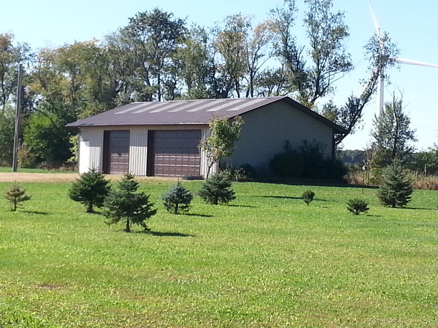 1555 Sublette Road Sublette, IL 61367 - Photo 3 of 11 a front view of a house with a yard