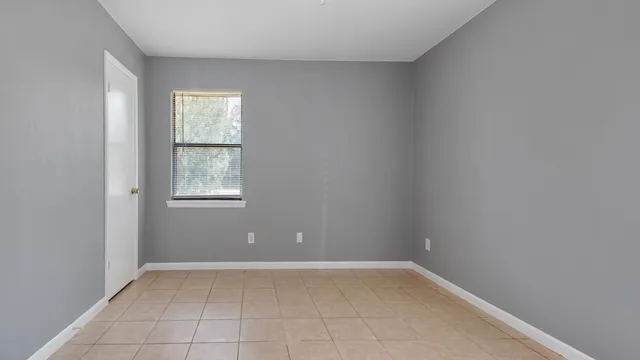 an empty room with a window
