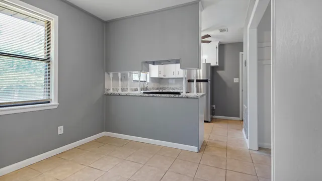 a view of kitchen and chandelier