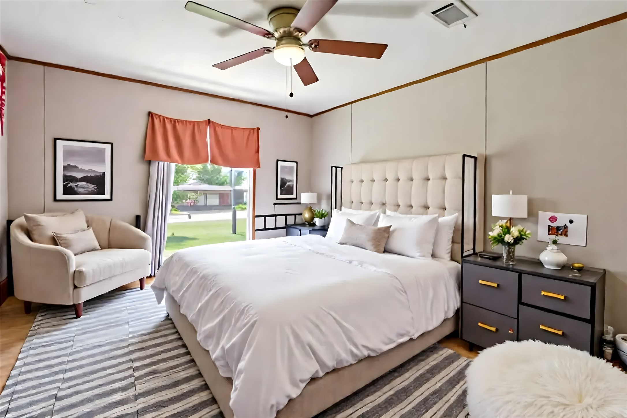 1721 Main Street Danbury, TX 77534 - Photo 9 of 17 a bedroom with a bed and a couch