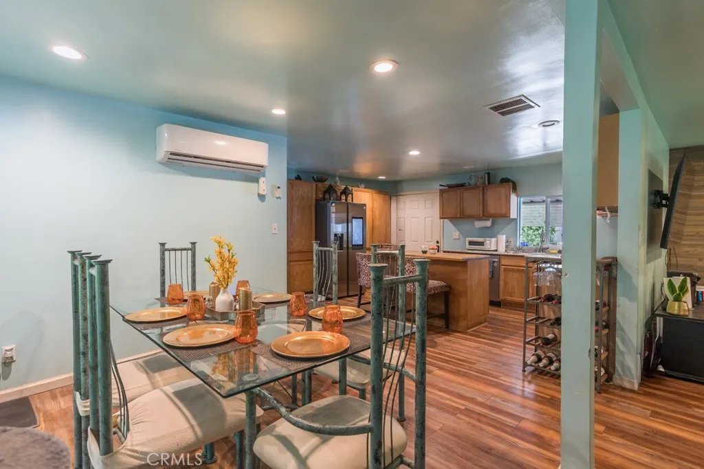 23500 The Old Road, Unit 35 Newhall, CA 91321 - Photo 13 of 43 a view of a dining room with furniture