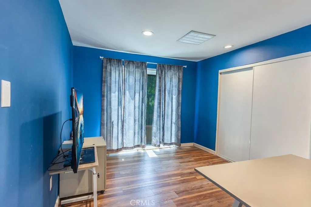 23500 The Old Road, Unit 35 Newhall, CA 91321 - Photo 21 of 43 a view of empty room with wooden floor