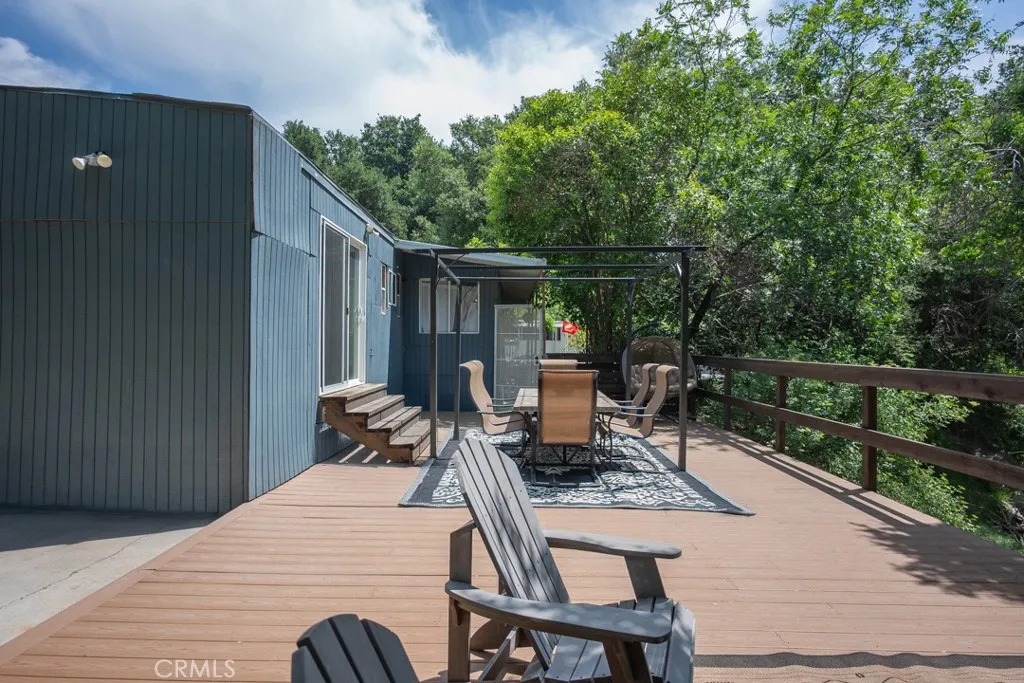 23500 The Old Road, Unit 35 Newhall, CA 91321 - Photo 28 of 43 a patio view with a seating space