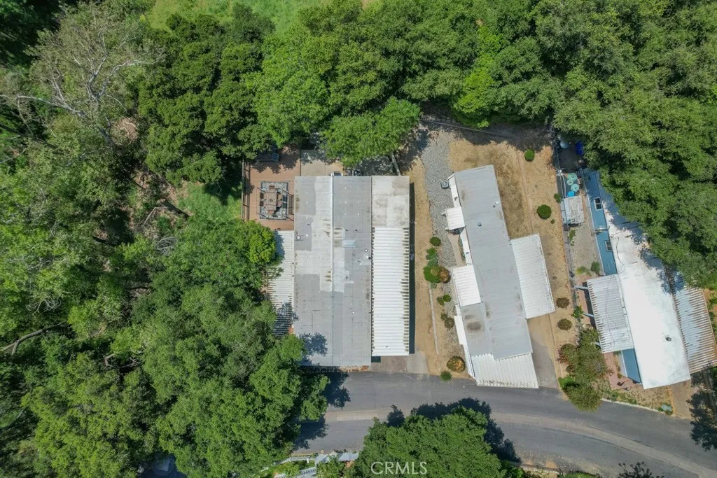 23500 The Old Road, Unit 35 Newhall, CA 91321 - Photo 41 of 43 an aerial view of residential house with outdoor space and trees