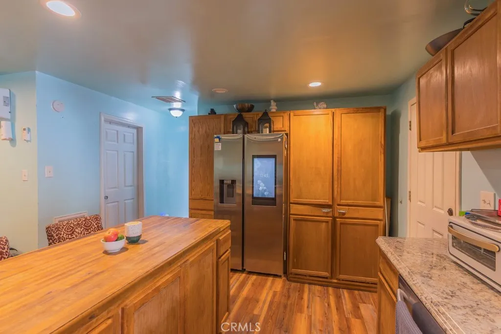 23500 The Old Road, Unit 35 Newhall, CA 91321 - Photo 9 of 43 a bathroom with a sink and a large mirror