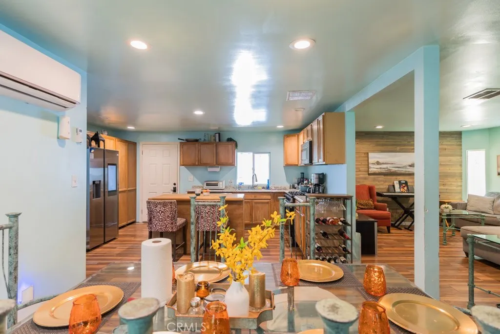 23500 The Old Road, Unit 35 Newhall, CA 91321 - Photo 10 of 43 a large kitchen with lots of counter space and furniture