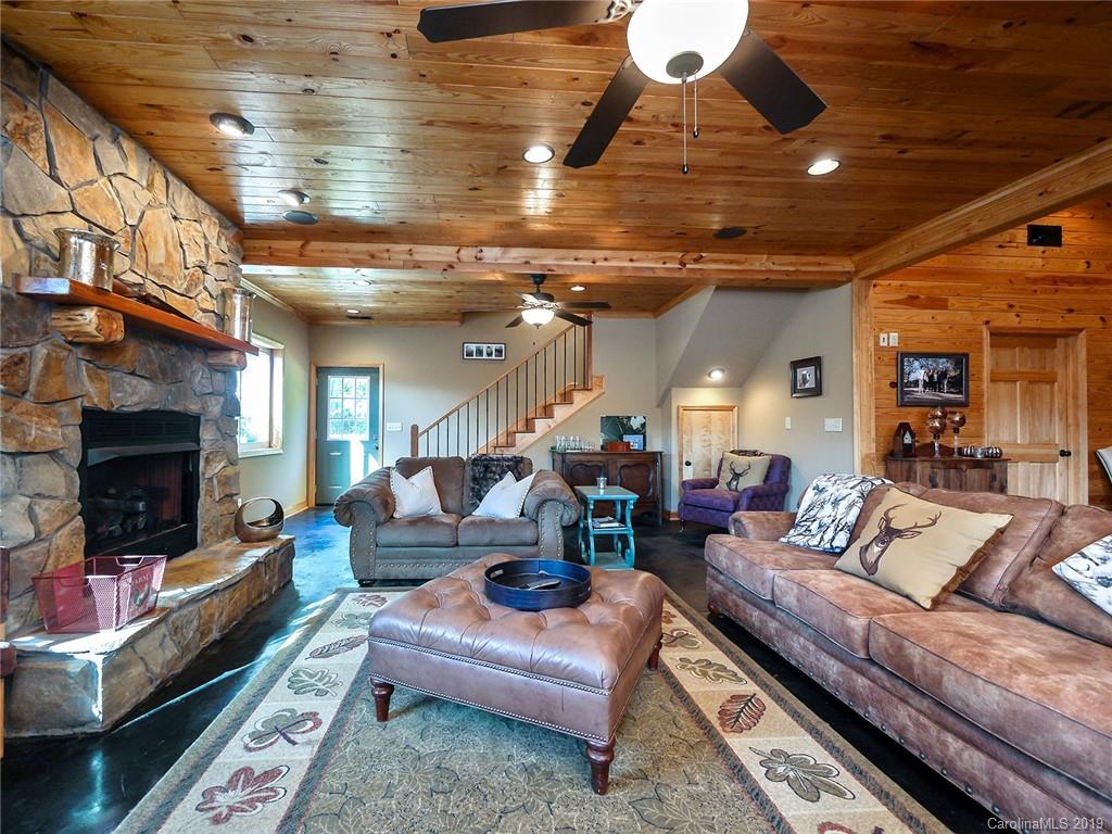 4188 Tobe Road Edgemoor, SC 29712 - Photo 11 of 38 a living room with furniture and a fireplace
