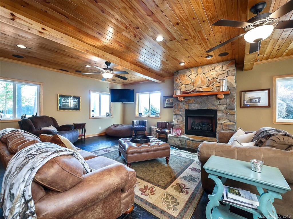 4188 Tobe Road Edgemoor, SC 29712 - Photo 12 of 38 a living room with furniture and a fireplace