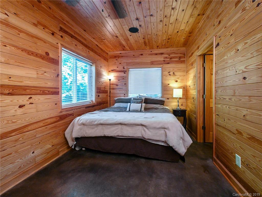 4188 Tobe Road Edgemoor, SC 29712 - Photo 13 of 38 a spacious bedroom with a bed and large windows