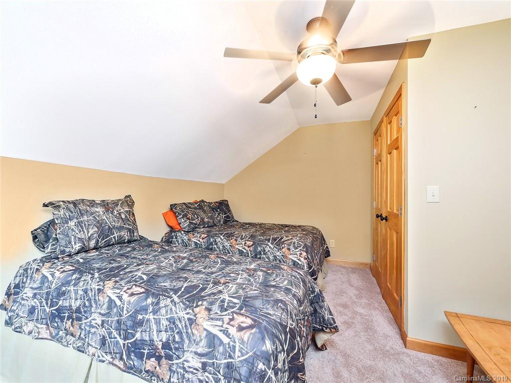 4188 Tobe Road Edgemoor, SC 29712 - Photo 18 of 38 a bed sitting in a bedroom next to a window