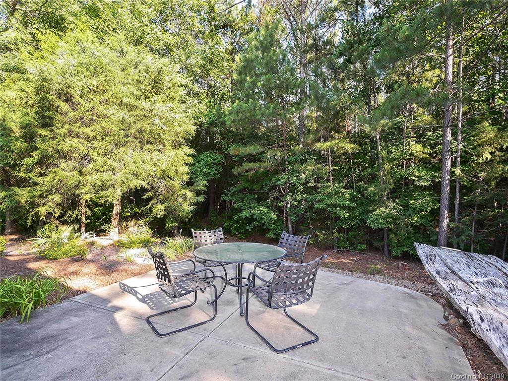 4188 Tobe Road Edgemoor, SC 29712 - Photo 19 of 38 a view of patio with table and chairs and potted plants