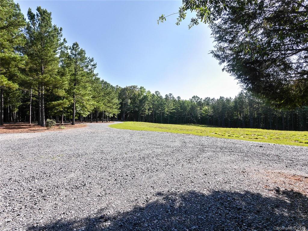 4188 Tobe Road Edgemoor, SC 29712 - Photo 27 of 38 a view of a swimming pool and a yard