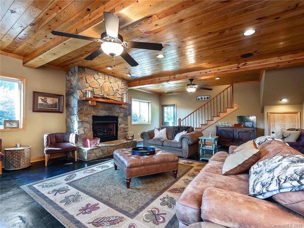 4188 Tobe Road Edgemoor, SC 29712 - Photo 10 of 38 a living room with furniture and a fireplace