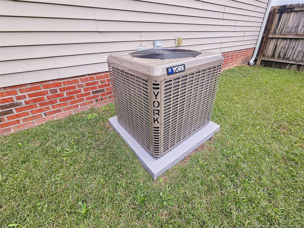 409 Sharpsburg Road Fayetteville, NC 28311 - Photo 7 of 7 a view of a backyard with a garden