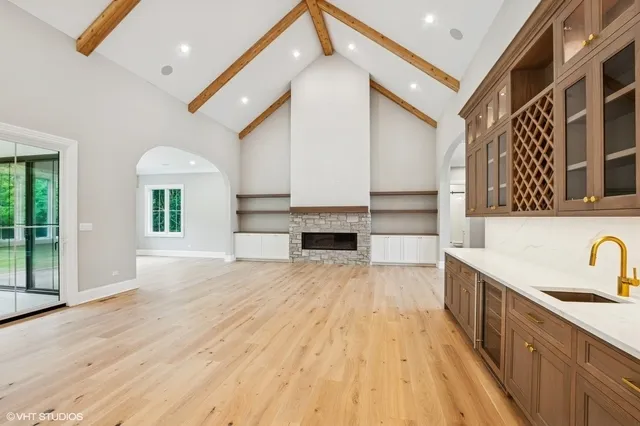 a view of a kitchen with a sink and cabinets