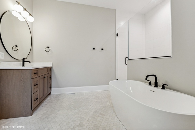 10940 German Church Road La Grange, IL 60525 - Photo 29 of 40 a bathroom with a sink and a mirror