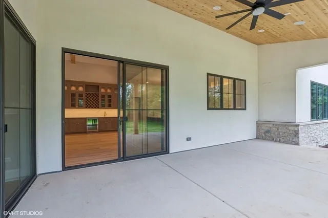 a view of a porch with a backyard